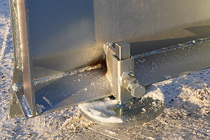 Justerbar fot på snøplog